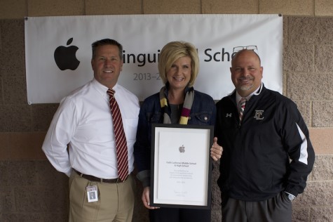 Faith Lutheran CEO Dr. Steven Buuck, Middle School Principal Ms. Sarah Heislen, and High School Principal Mr. Scott Fogo hold the Apple Distinguished School certificate.  The award shows Faith as officially recognized by Apple for outstanding student education with the use of technology.