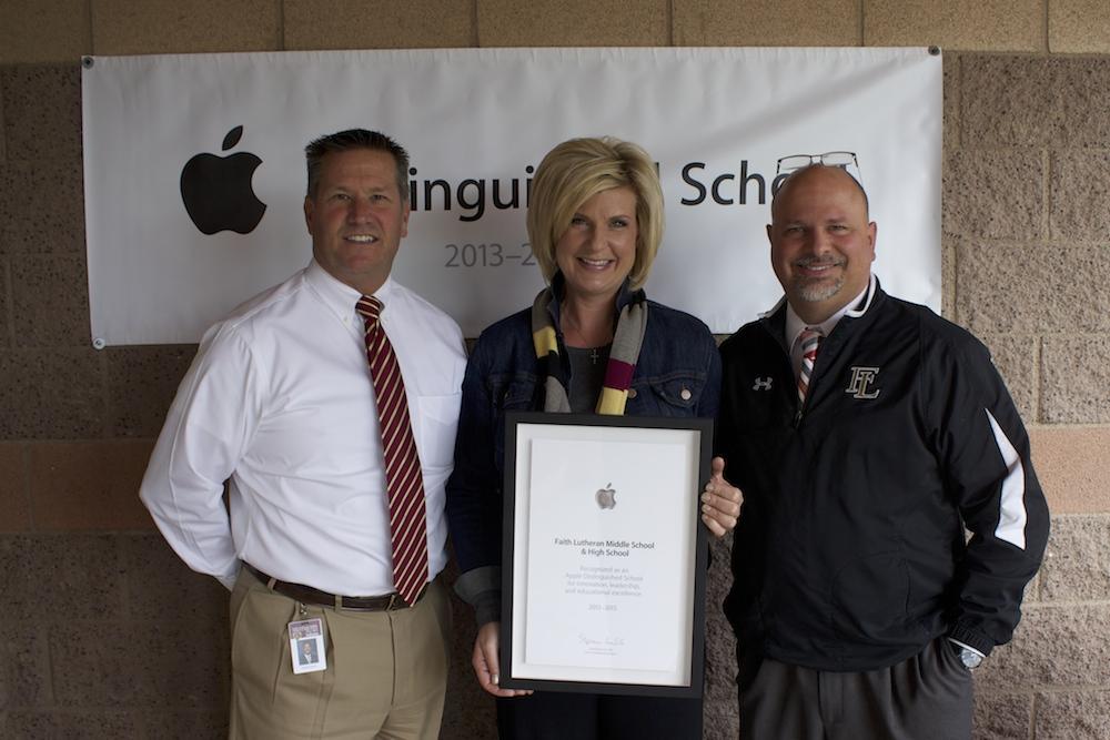 Faith Lutheran CEO Dr. Steven Buuck, Middle School Principal Ms. Sarah Heislen, and High School Principal Mr. Scott Fogo hold the Apple Distinguished School certificate. The award shows Faith as officially recognized by Apple for outstanding student education with the use of technology.