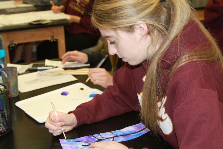 Conservatory student Jordyn Dunseath works on a water color piece during her art class. 