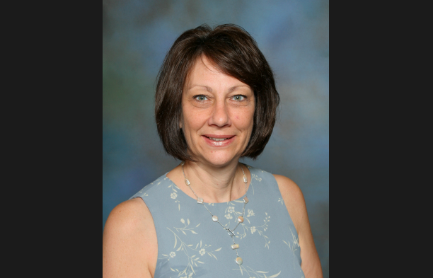 Photo caption: One of Mrs. Dunning's many yearbook pictures during her time teaching at Faith Lutheran. 
Photo by Bernhard and Williams Photography. 