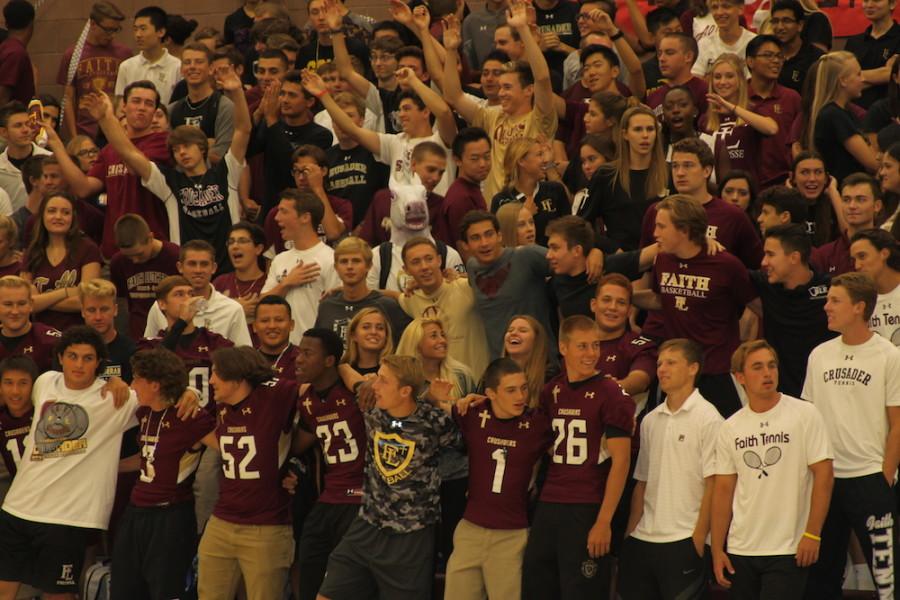 Faith Lutheran Seniors cheer at a fall assembly.