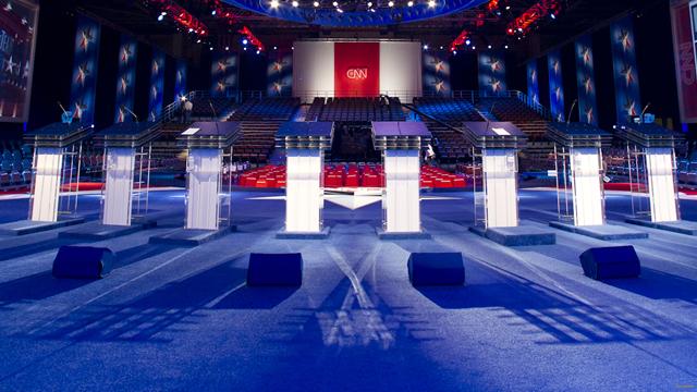 The stage is set for the Democratic Candidates to take the stage. 

Picture Credit to: http://i2.cdn.turner.com/cnn/2011/images/10/05/t1larg.debate-stage-empty.t1larg.jpg