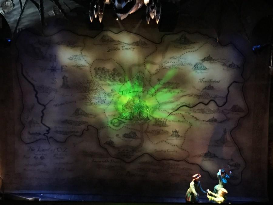 Photo caption: The Emerald City brightens the stage during intermission