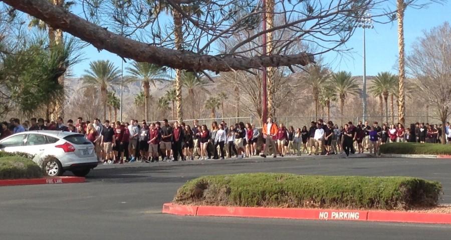 Photo Caption: Students line  up and leave campus single-file in the reunification drill.