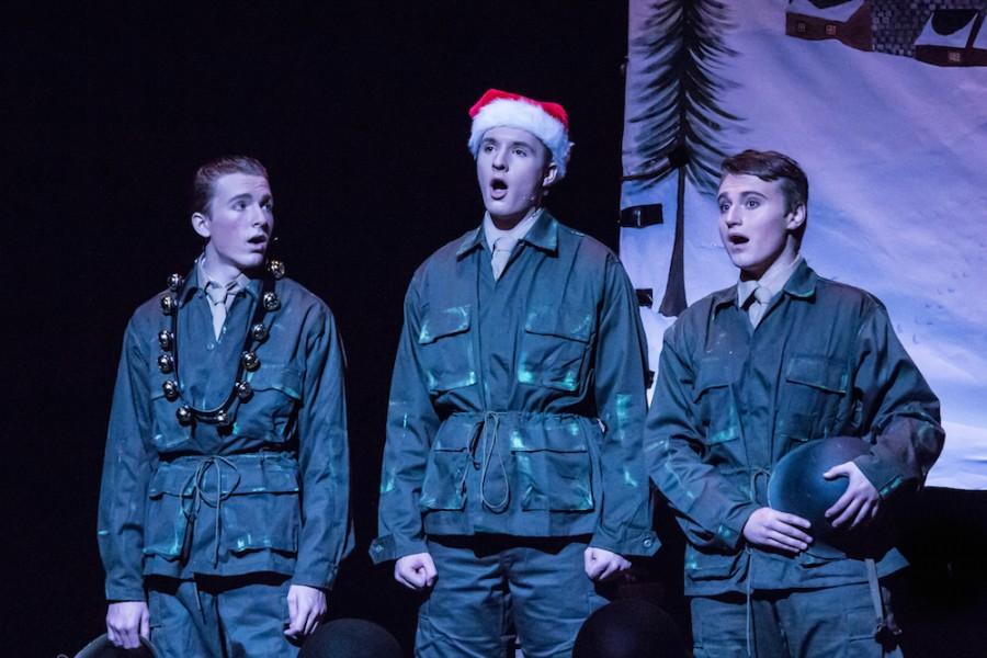 Photo caption: Christopher May (right) sings a Christmas tune in one of his favorite musicals White Christmas back in 2014. Also pictured, Harrison and Jackson Langford.