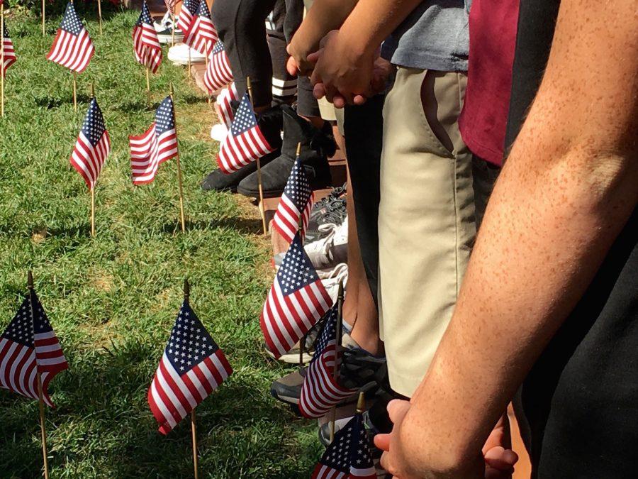 During the service, students pray over families who've lost loved ones.