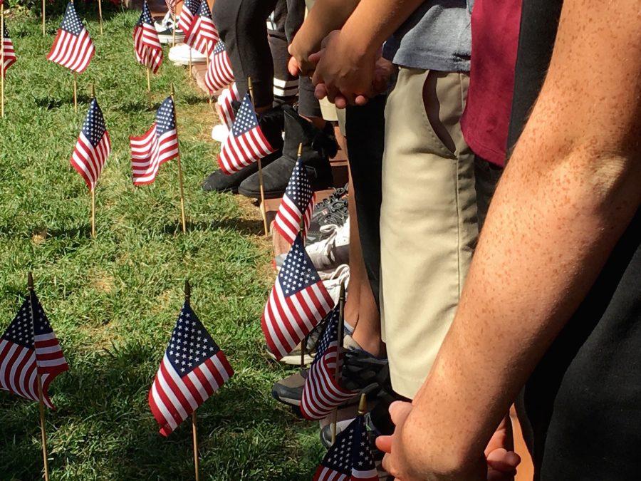 During the service, students pray over families whove lost loved ones.