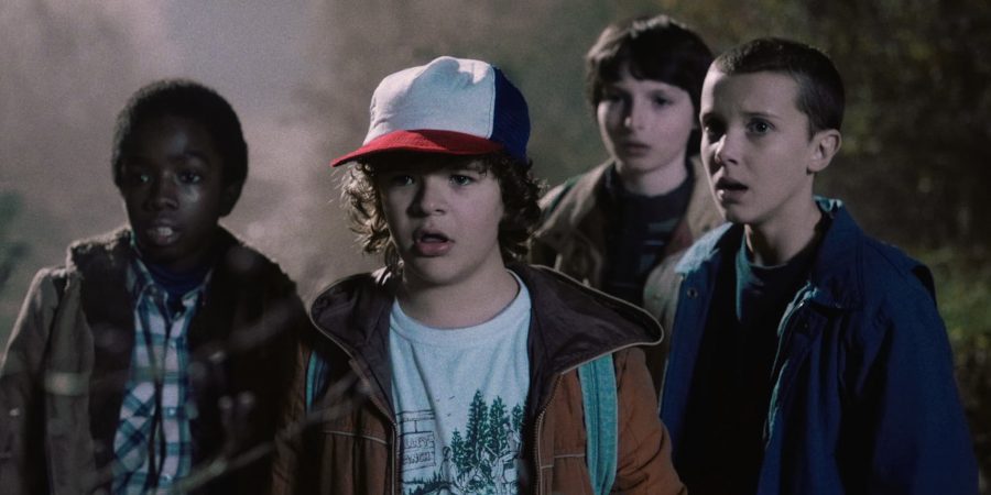 Stranger Things main character's gather in the forest to find out the mystery behind the lost boy.
