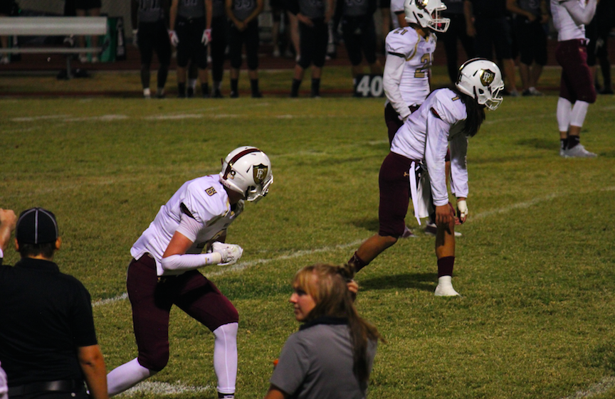 Joshua Hong ('18) and Elijah Kothe ('18) both prepare for an offensive play against Panther defense