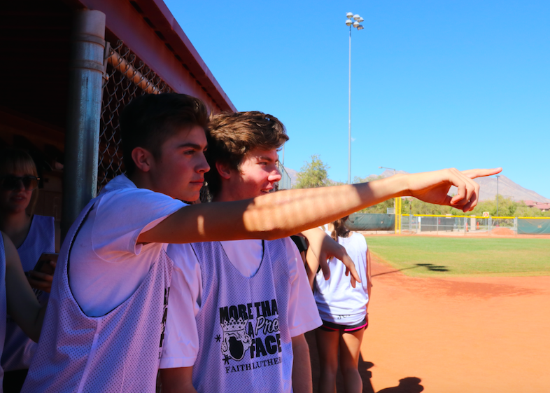 Greg Price & Parker Kanne, junior coaches, examine the action of powderpuff