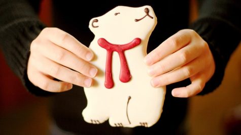 The polar bear cookies who's red scarves cause the bears to appear to have their throats cut.