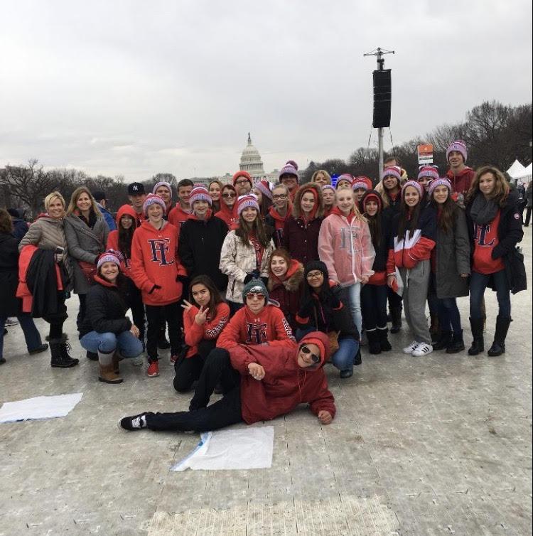 Eighth+graders+pose+for+a+picture+in+front+of+the+U.S.+Capital+Building%2C+one+of+the+many+historical+landmarks+they+visited+while+on+their+trip.