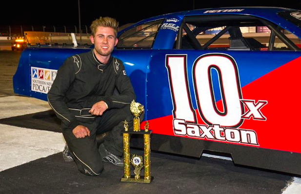 Photo caption: Peyton Saxton receives first NASCAR Super Late Model trophy for race on March 25, 2017.