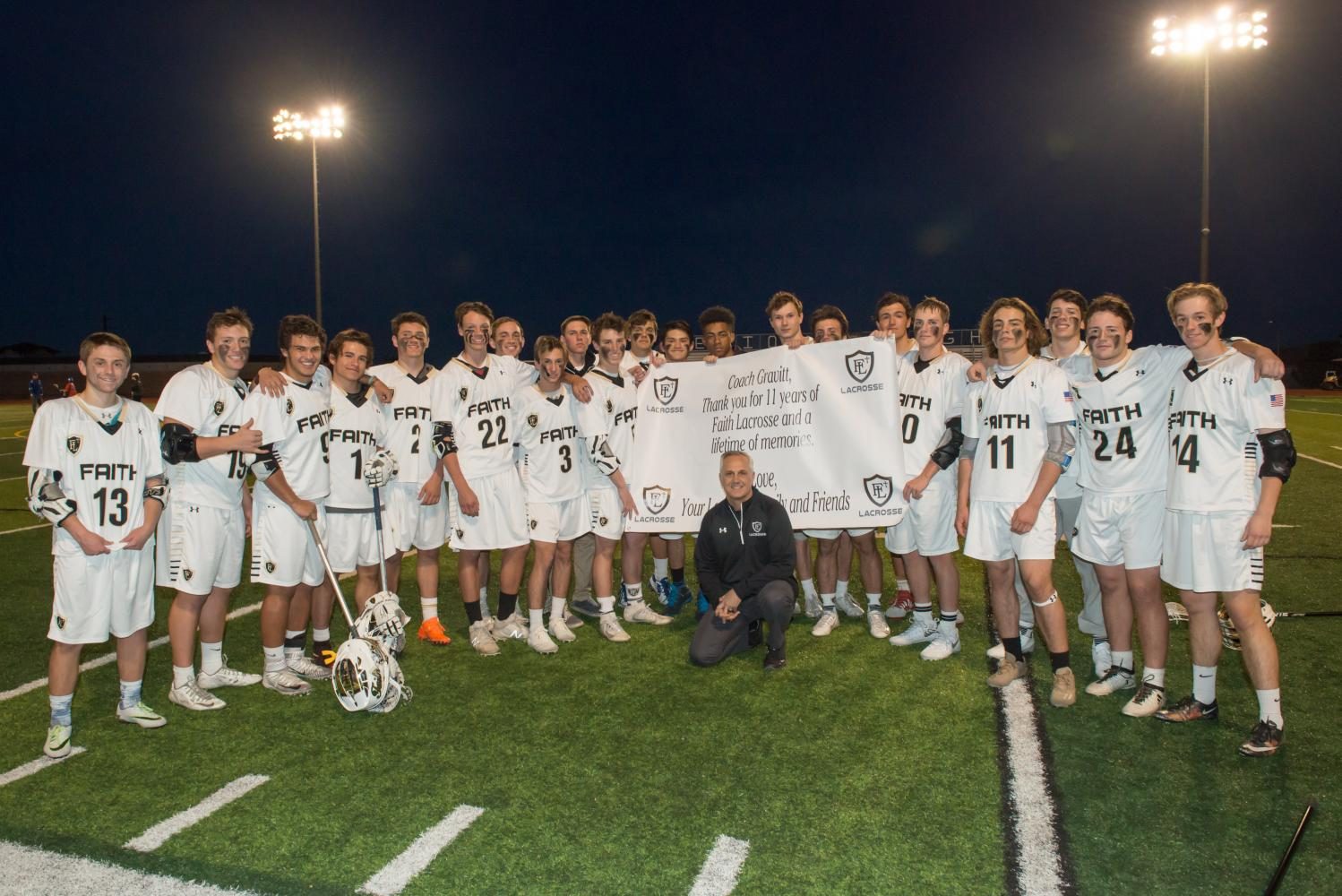 The team celebrating Coach Gravitt's eleven years with the program.
Photo by Bill Stanton.