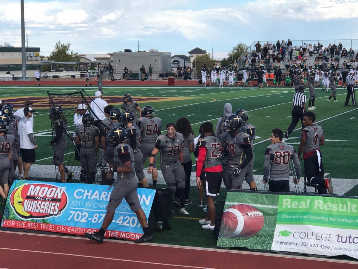 Captain John Thomson (#32) fires up his fellow Crusaders during the fourth quarter of their game against the Panthers.