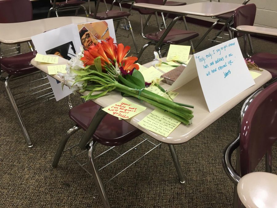 The students in one of Julians classes set up a memorial at his desk, proving he will be missed by all that knew him.