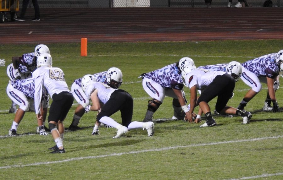 Seniors, Carson Cook (OLB)  and Trent Teunis (NG), guard the line as the Cru is up 41-7. 