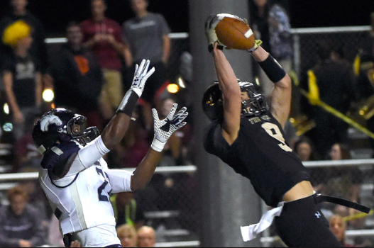 Keagan Touchstone, #9, catches an interception from Aubréy Nélléms o add to the Crusaders lead.