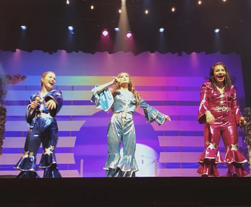 The Dynamos of the red cast, Tanya (Ashley Thormahlen), Donna (Grace Parker), and Rosie (Ellie Karris) sing a ballad of classic ABBA songs featured in this fun, heart-felt, up beat show. 