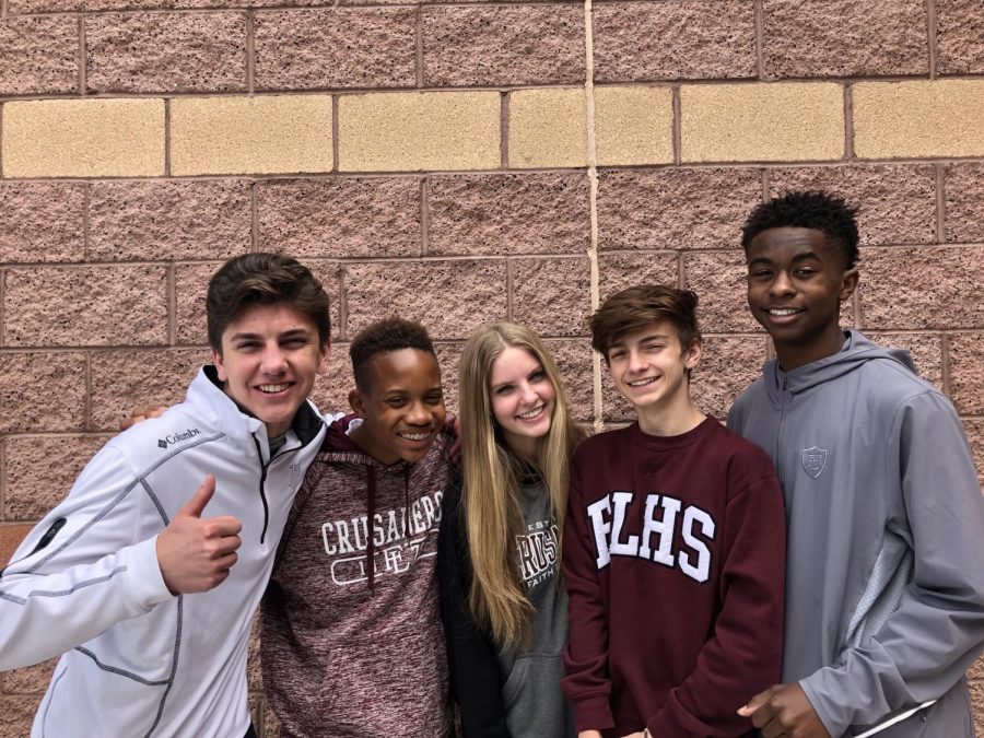Students pose in their uniforms, but which are following dress code, and who isn't? 