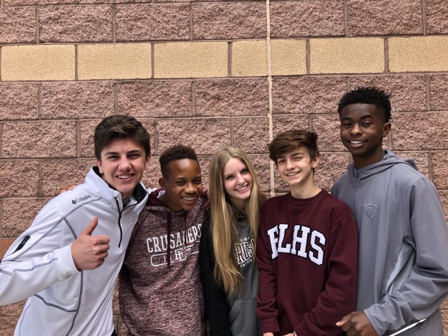 Students pose in their uniforms, but which are following dress code, and who isnt? 