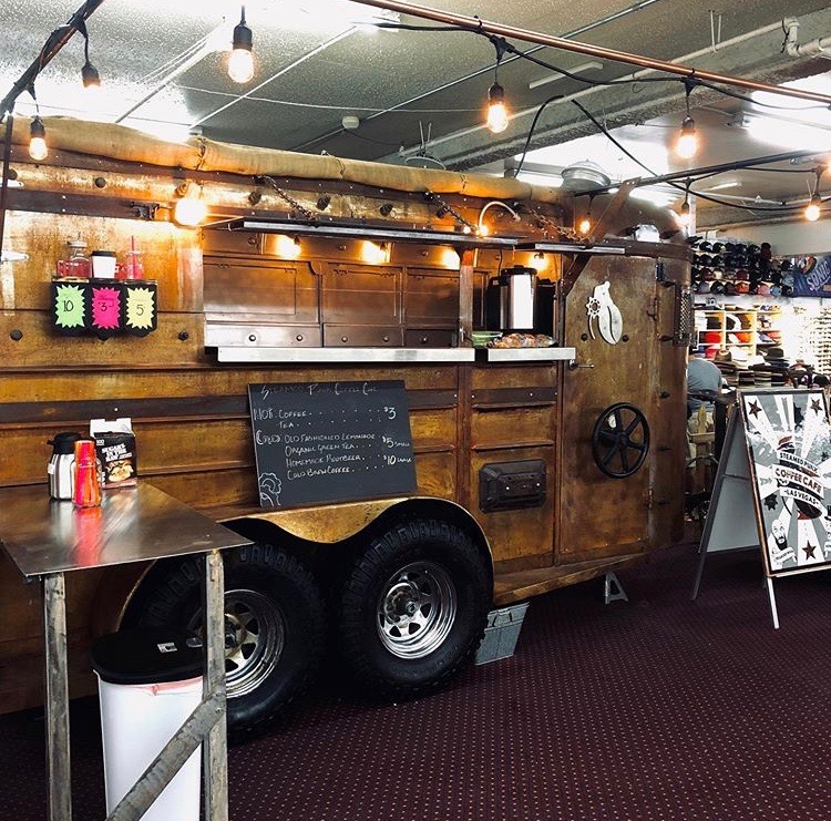Steamed Punk Coffee is located in the front left corner of the Fantastic Sam's Indoor Swap Meet. 