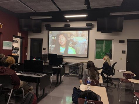 An advisory class watching chapel together. 