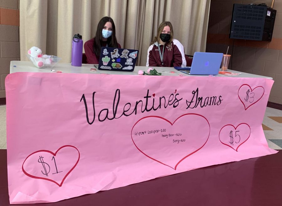 Student council members sitting at their throne of Valentine power.