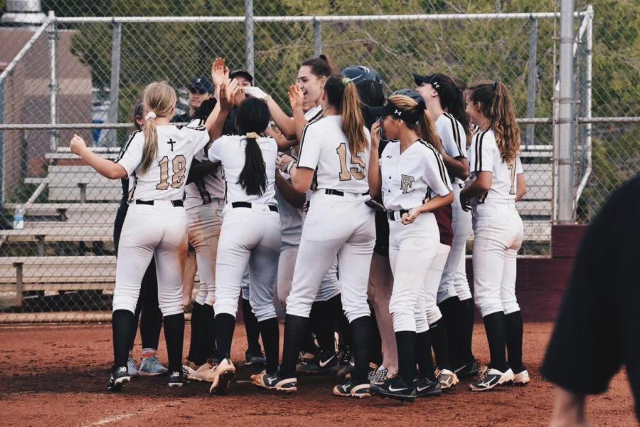 Varsity+Girls+Celebrate+After+a+Homerun