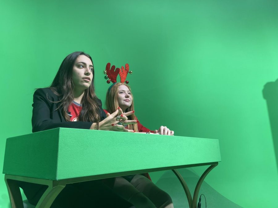 Sophia Bonner and Addisen Binderim are in the Christmas spirit.