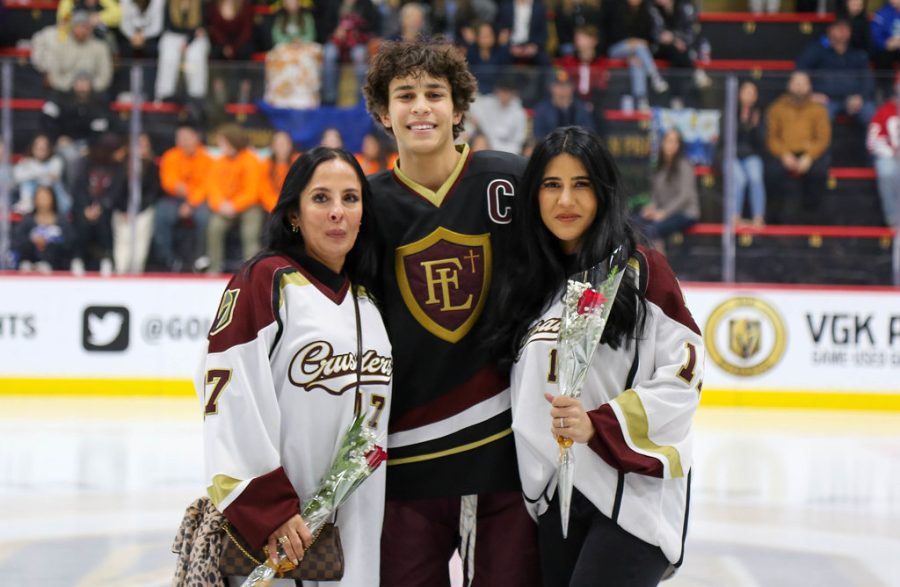 Lazaro Tito Cabrera with his family during Faith Lutherans Senior Night hockey game.