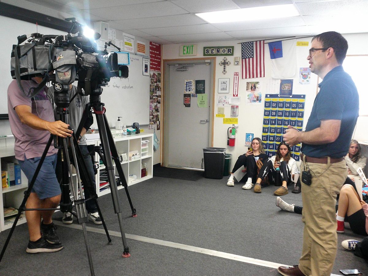 Mr. Heupel shares his passion for the Spanish Soap Opera Club with News 3 photojournalist.
