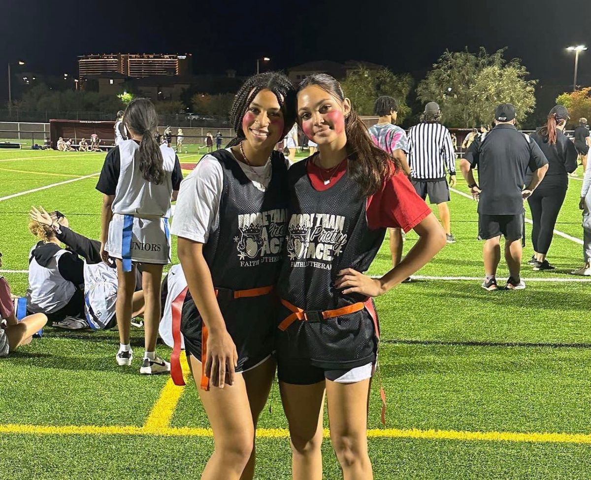 Seniors Ava Walker and Jill Molnar during the first year of girls flag football at Faith Lutheran. 