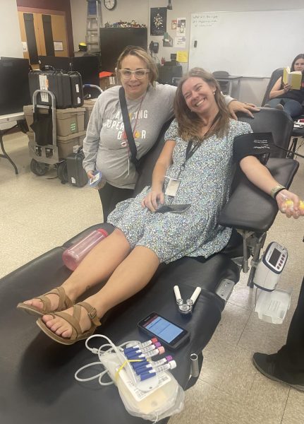 Faith Lutheran teachers Kathy Grant and Makayla Kosberg donate blood at the September blood drive. 