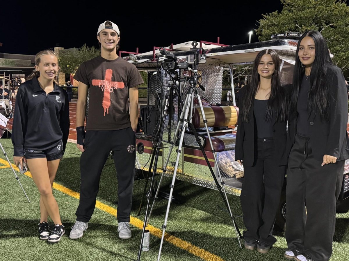 The FLNN crew reporting from the homecoming football game. Jamie Madsen, Cole Jessa, Addi Jarvis and Milan Norton.