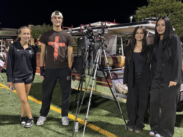 The FLNN crew reporting from the homecoming football game. Jamie Madsen, Cole Jessa, Addi Jarvis and Milan Norton.